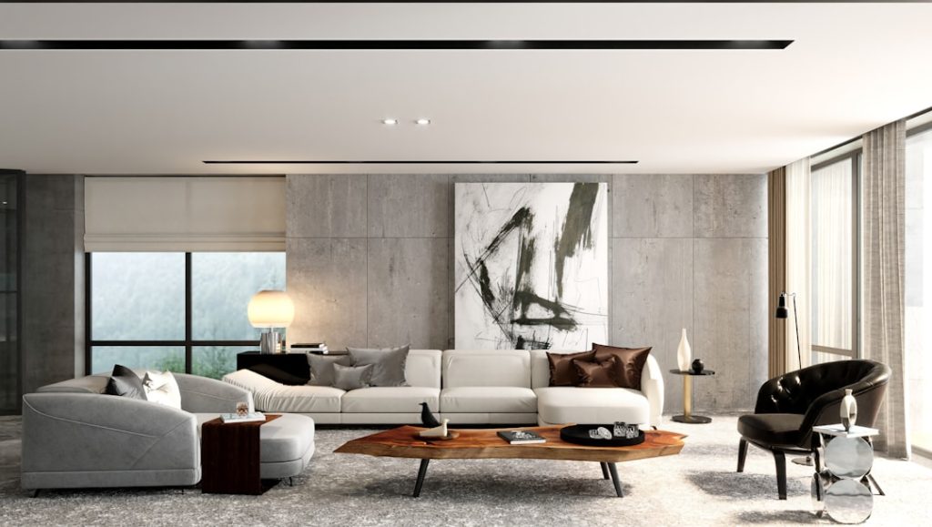 Minimalist Luxury Living Room with Concrete Wall and Live Edge Table A high-end, contemporary living room that epitomizes modern industrial luxury. The space is anchored by a large, pale sectional sofa and a striking live-edge wood coffee table. A textured raw concrete accent wall serves as a dramatic backdrop for a large, abstract black and white artwork. The minimalist design features subtle gray tones, plush seating, and floor-to-ceiling windows with ample natural light. Perfect for interior design, architecture, luxury real estate, and sophisticated lifestyle content.